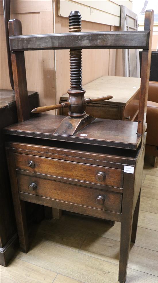 A Georgian mahogany press table with two drawers, on square tapering legs W.66cm